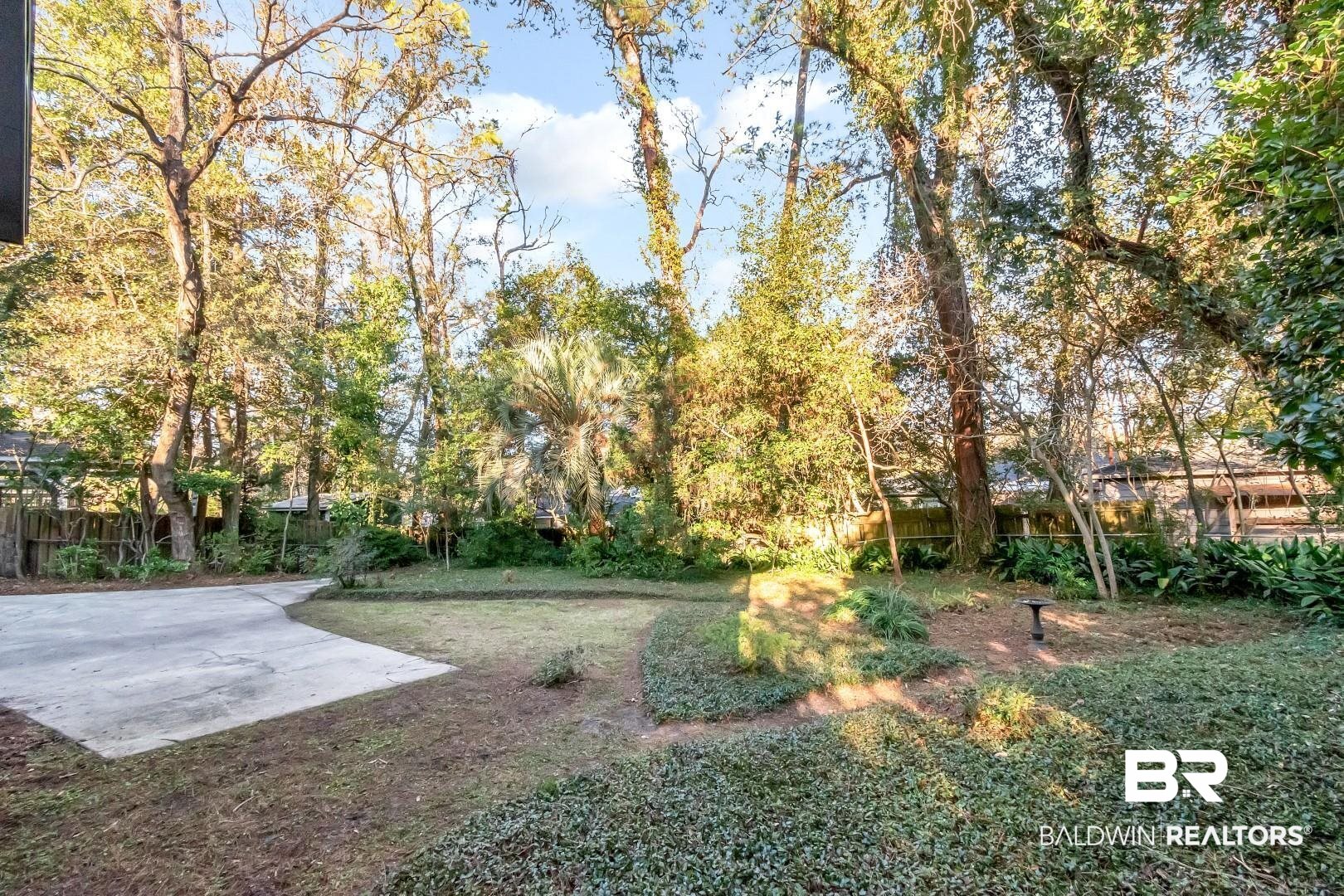 308 Brawood Drive Mobile, AL 36608 - Photo 26 of 33 View of yard featuring a patio