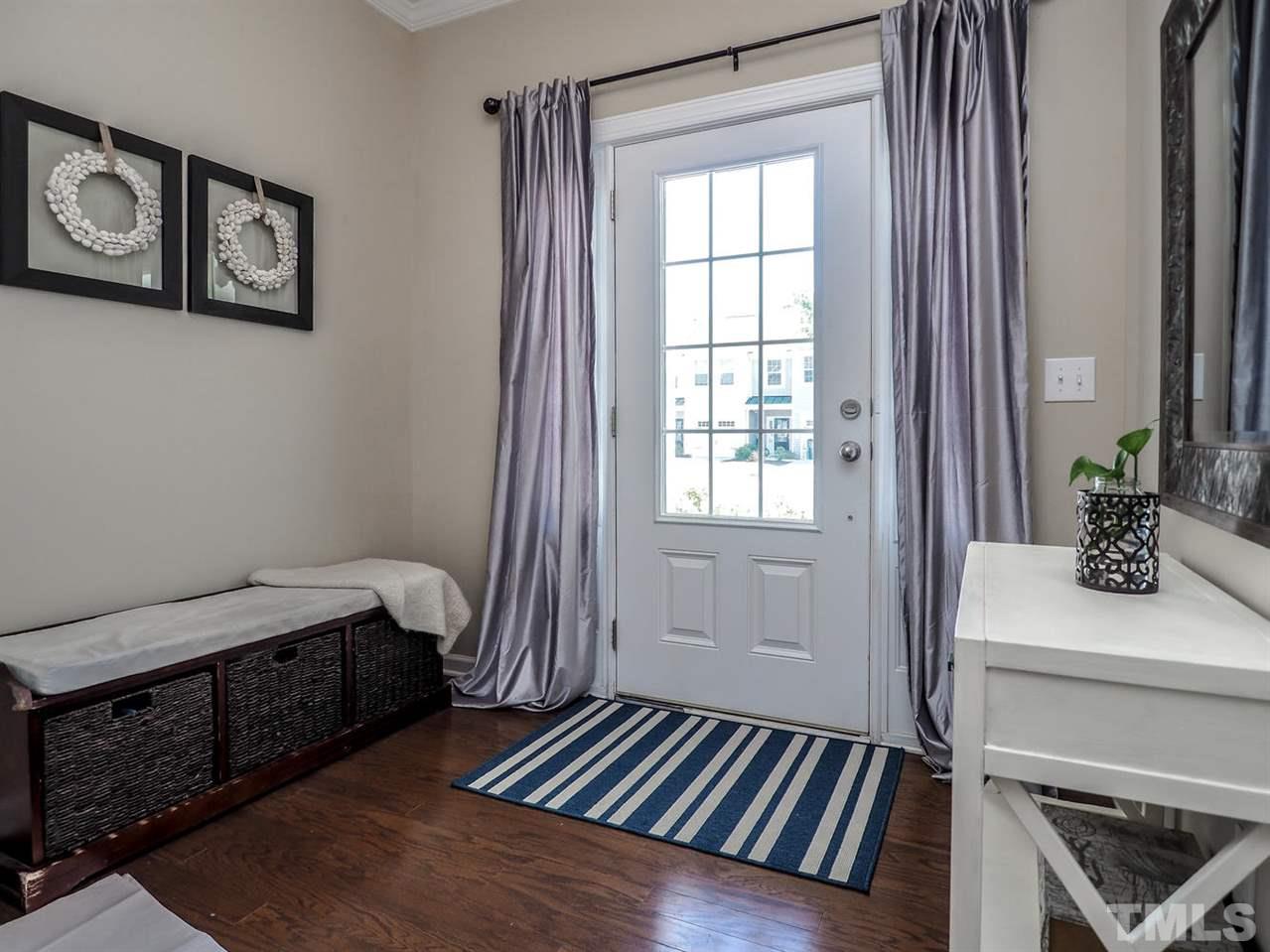 1105 Falcon Ridge Lane Morrisville, NC 27560 - Photo 14 of 22 a bedroom with a bed and a window