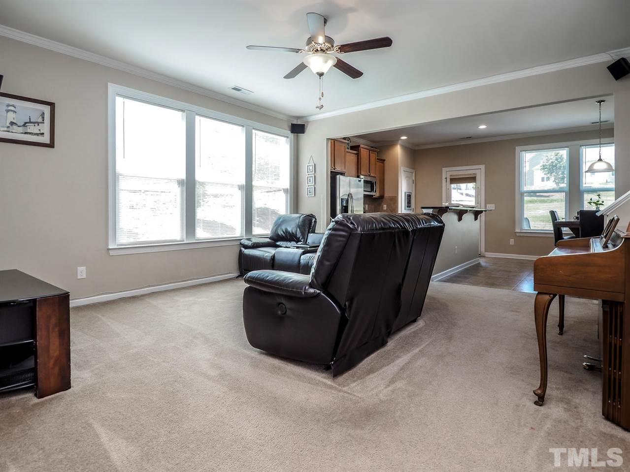 1105 Falcon Ridge Lane Morrisville, NC 27560 - Photo 6 of 22 a living room with furniture and a large window