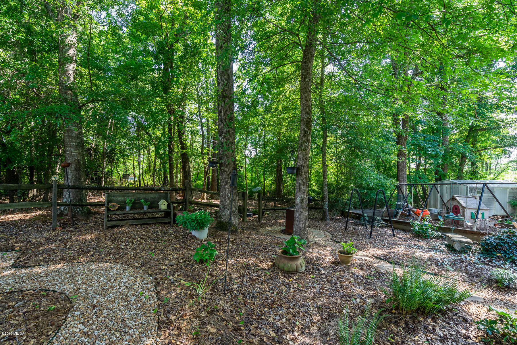 846 Boxankle Road Forsyth, GA 31029 - Photo 14 of 20 a backyard of a house with lots of green space