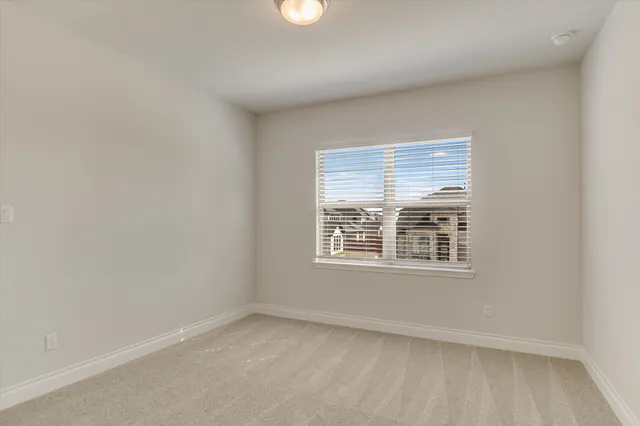 a bedroom with a bed and furniture