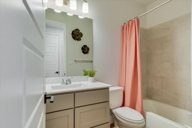 a room with a bed and a window