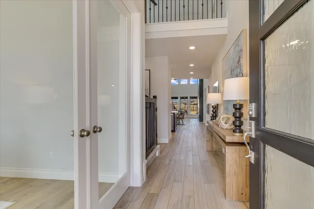 a view of a living room and a bathroom with a sink