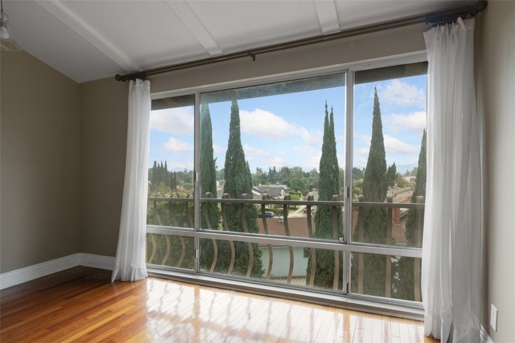 12830 Burbank Boulevard, Unit 316 Valley Village, CA 91607 - Photo 8 of 18 a view of a large window with an outdoor space