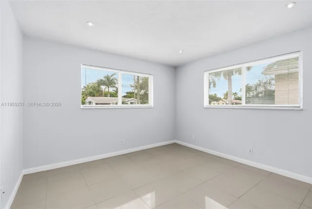 an empty room with windows