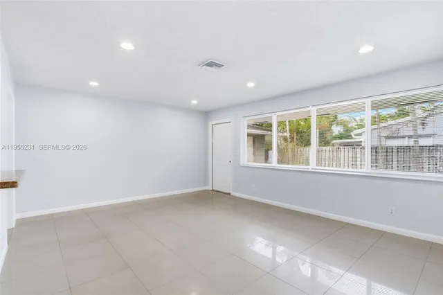 an empty room with windows