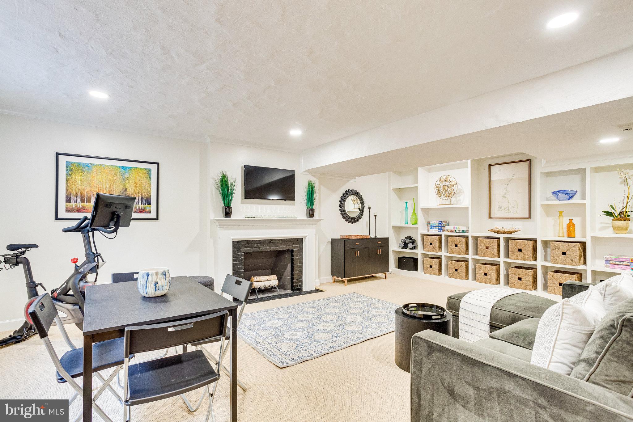 3108 Rolling Road Chevy Chase, MD 20815 - Photo 49 of 66 Basement/living area with fireplace