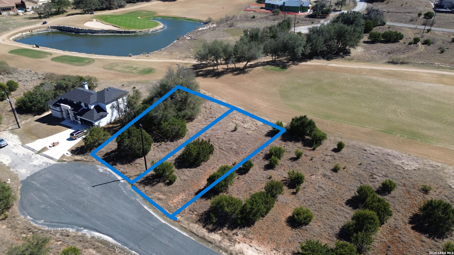 222 North Calvin Barrett Blanco, TX 78606 - Photo 14 of 33 an aerial view of a house a yard and mountain