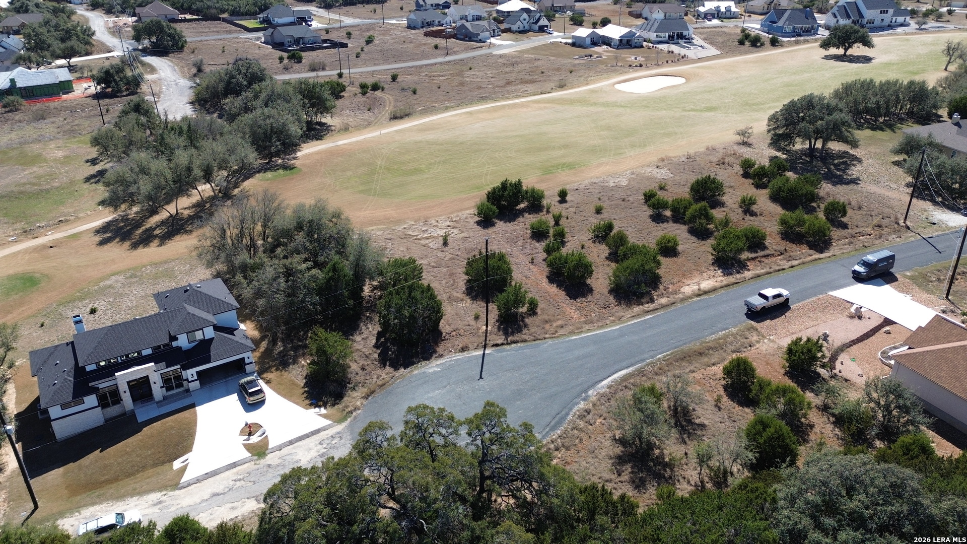 222 North Calvin Barrett Blanco, TX 78606 - Photo 16 of 33 an aerial view of residential houses with outdoor space