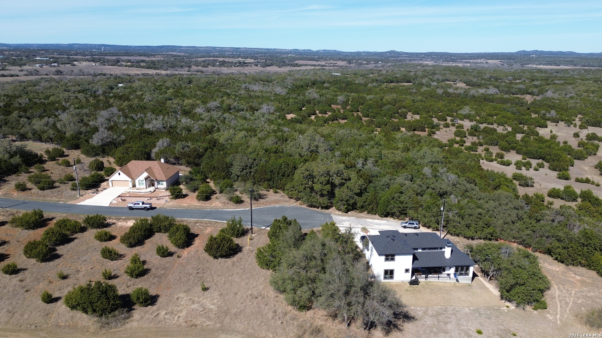 222 North Calvin Barrett Blanco, TX 78606 - Photo 23 of 33 an aerial view of a house with a yard