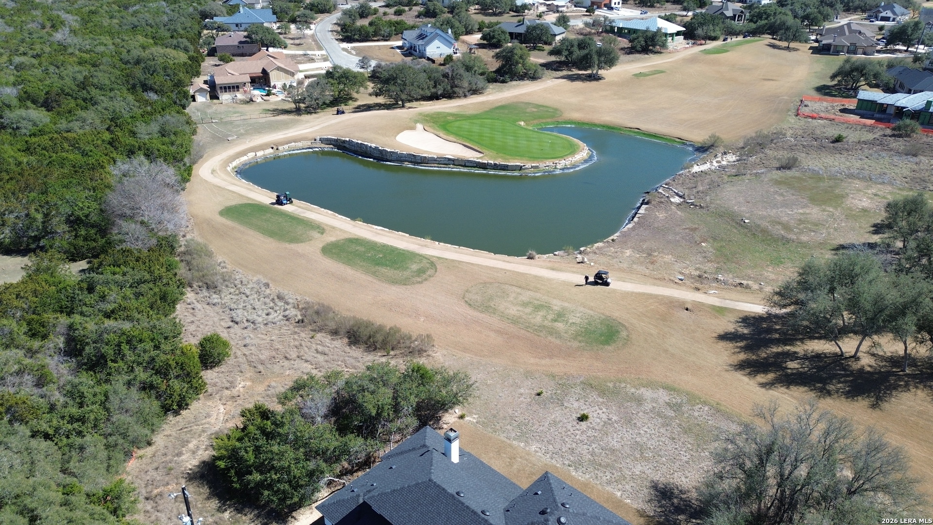 222 North Calvin Barrett Blanco, TX 78606 - Photo 27 of 33 an aerial view of a house with a yard and lake view