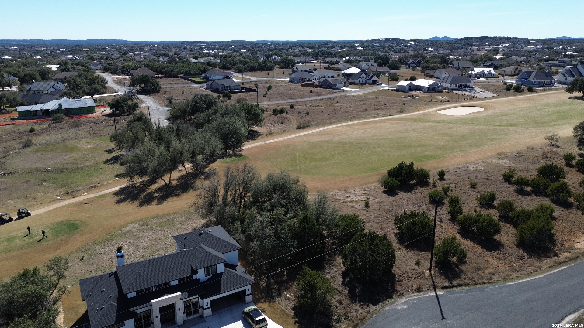 222 North Calvin Barrett Blanco, TX 78606 - Photo 31 of 33 an aerial view of residential houses with outdoor space