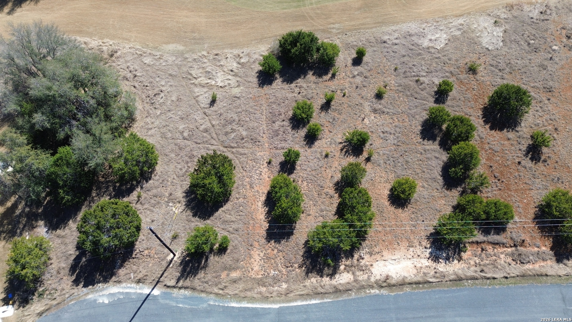 222 North Calvin Barrett Blanco, TX 78606 - Photo 33 of 33 an aerial view of a house with a yard