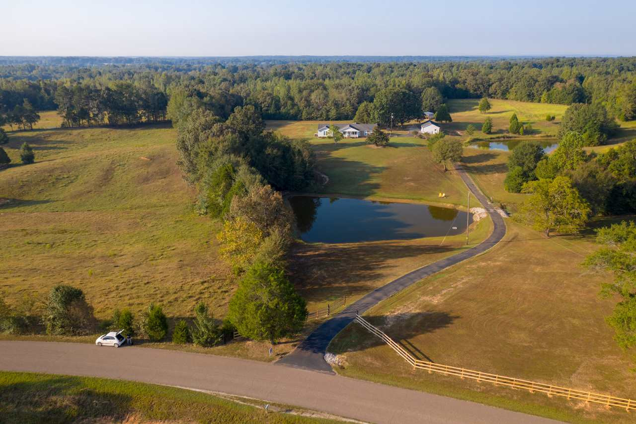 800 Enville Road Henderson, TN 38340 - Photo 1 of 1 a view of a swimming pool with a yard