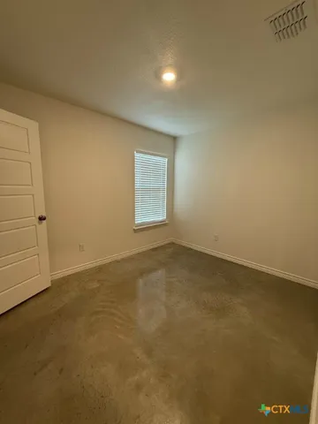 an empty room with a workbench