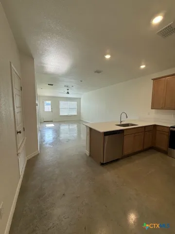 a view of an empty room with window