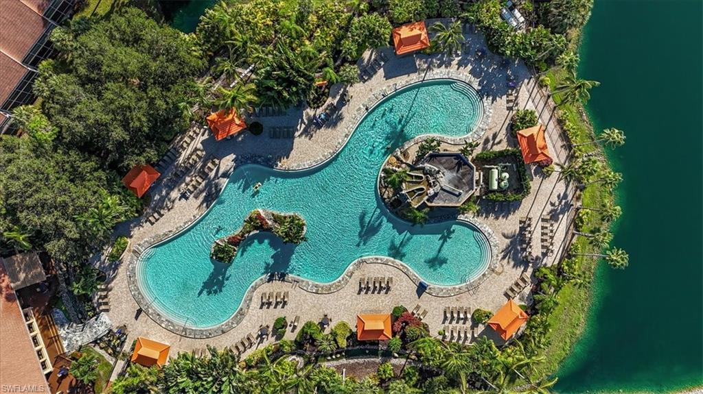 2386 Magnolia Avenue, Unit 7801 Naples, FL 34112 - Photo 1 of 38 an aerial view of a swimming pool