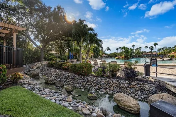 a garden view with a lake view