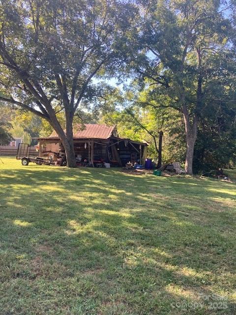 6700 Sisk-Carter Road Rockwell, NC 28138 - Photo 13 of 26 a view of swimming pool with an outdoor space
