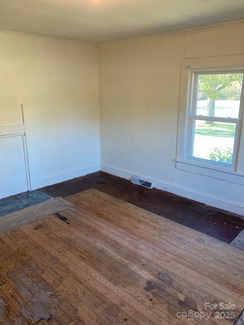 6700 Sisk-Carter Road Rockwell, NC 28138 - Photo 21 of 26 a view of empty room with wooden floor and fan