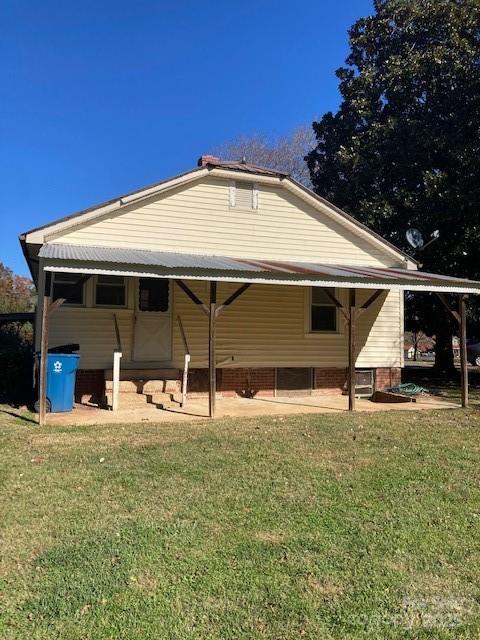 6700 Sisk-Carter Road Rockwell, NC 28138 - Photo 25 of 26 a view of a house with a yard and sitting area