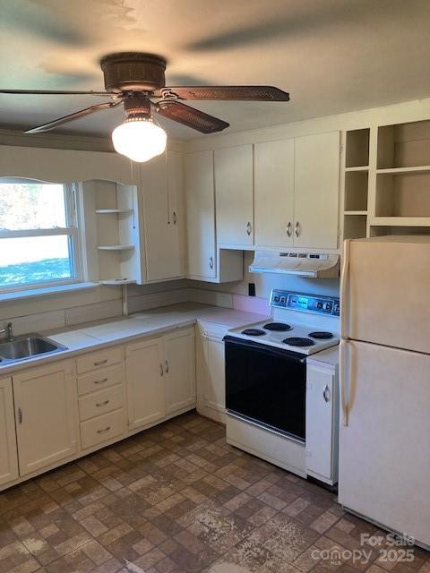 6700 Sisk-Carter Road Rockwell, NC 28138 - Photo 4 of 26 a kitchen with a stove and a sink