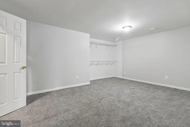 a view of room with walk in closet