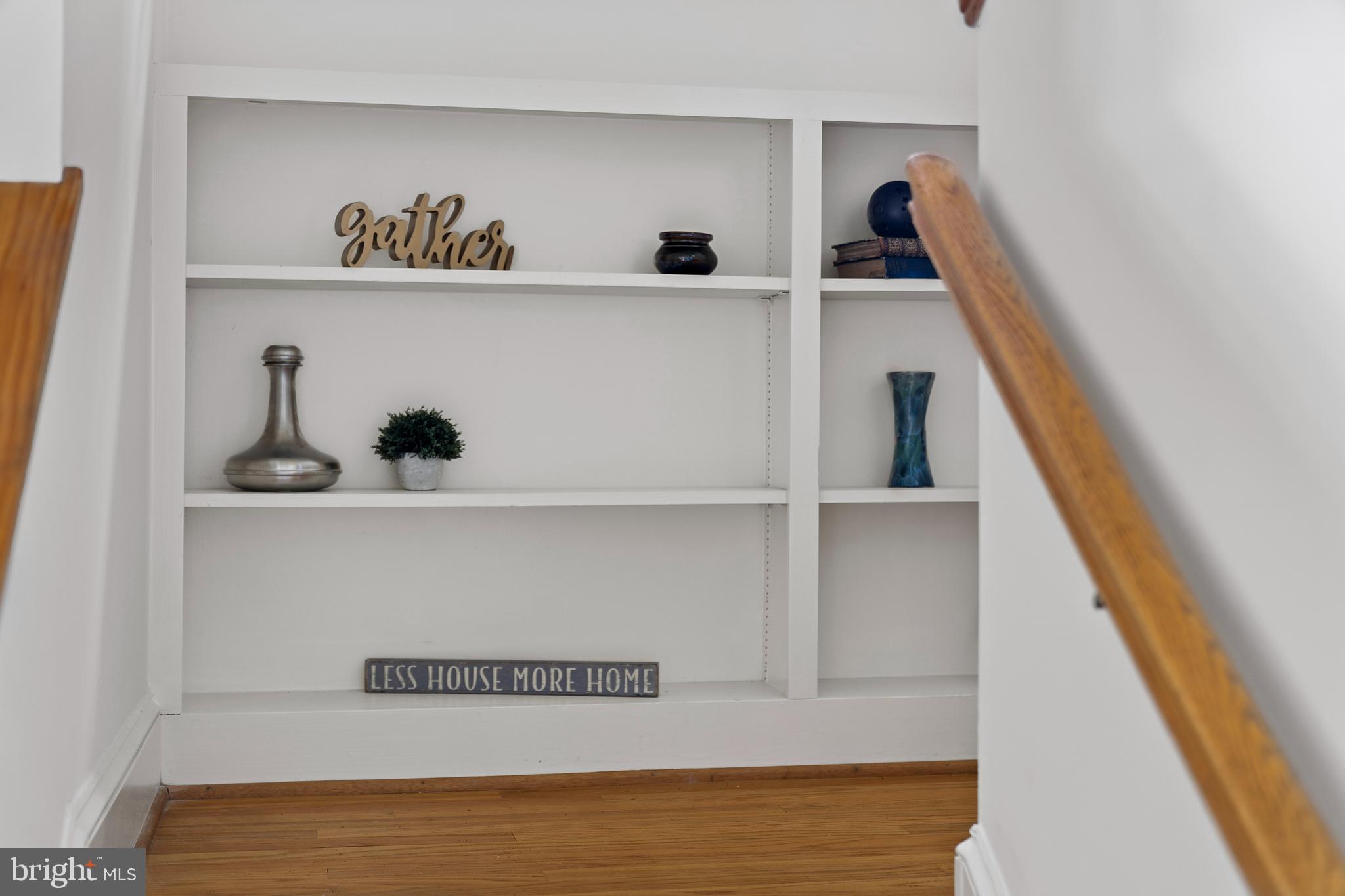 1077 Level Green Road Lancaster, VA 22503 - Photo 23 of 66 Custom built-ins on the stairway landing