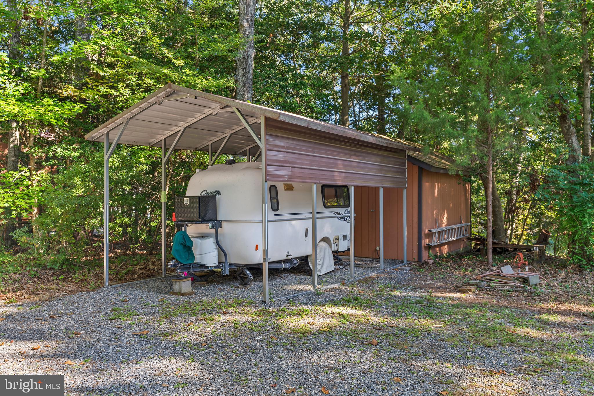 1077 Level Green Road Lancaster, VA 22503 - Photo 62 of 66 Custom-built shed with covered parking
