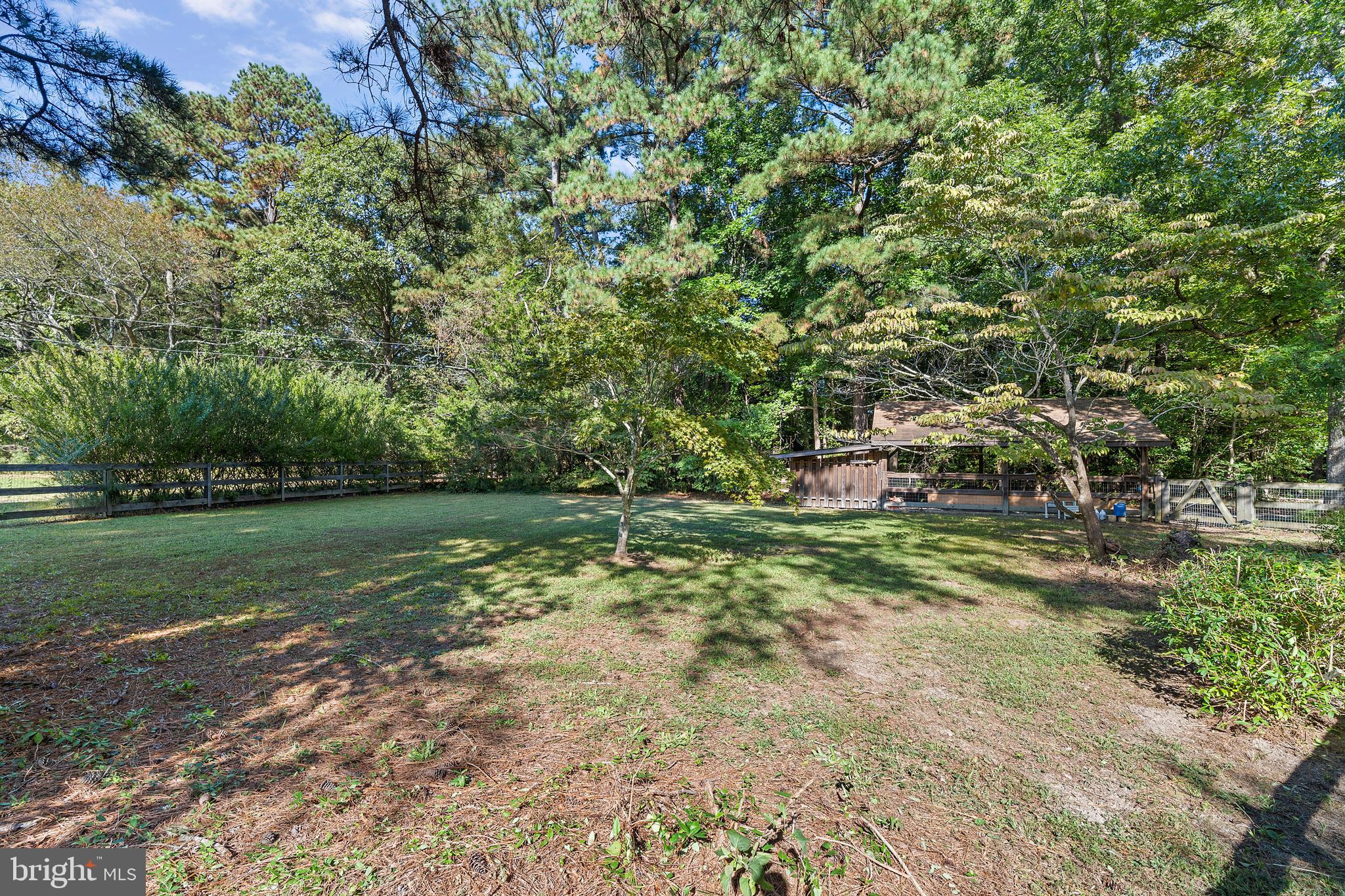 1077 Level Green Road Lancaster, VA 22503 - Photo 64 of 66 Fenced in area in front next to covered parking