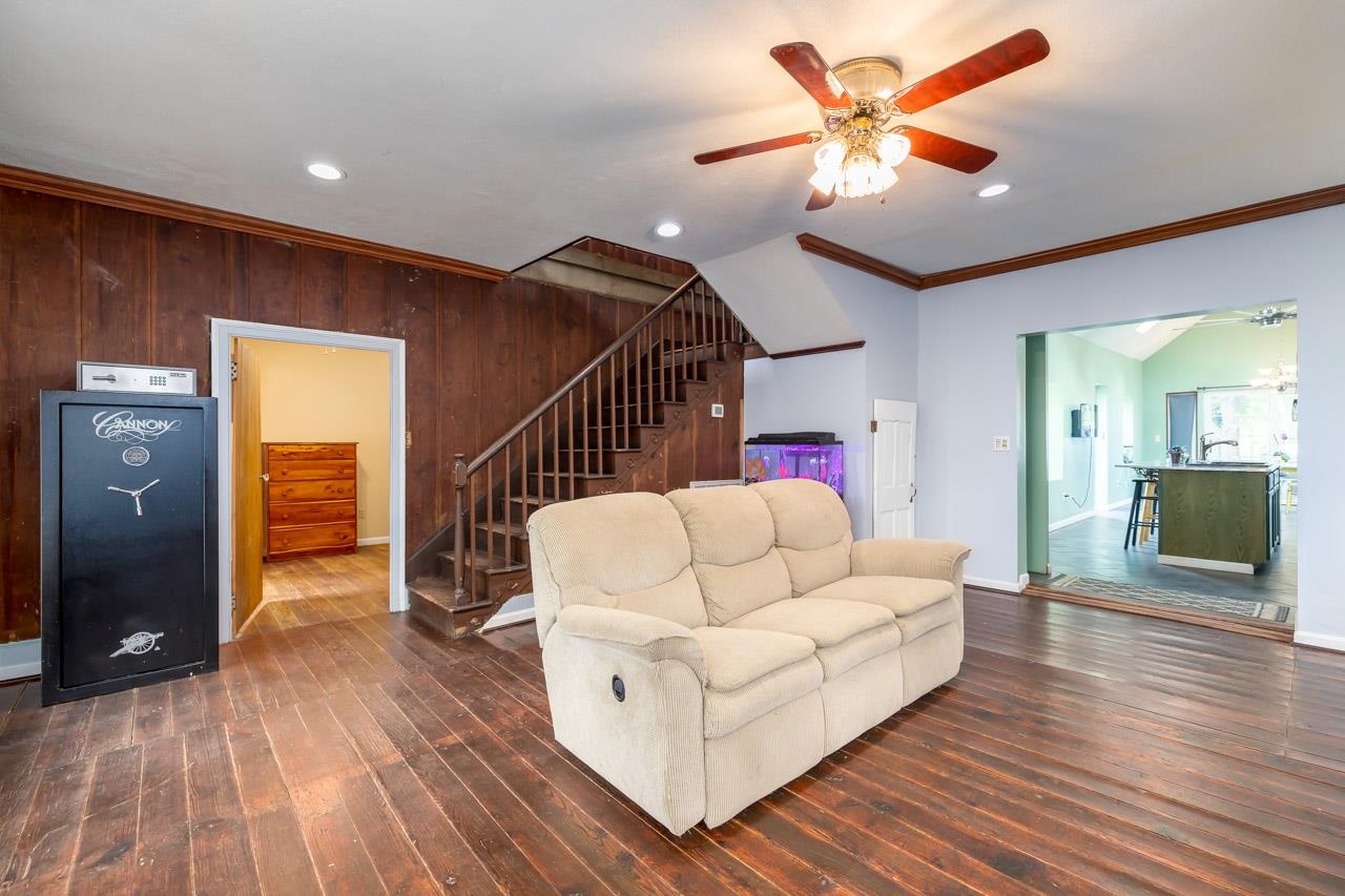 4147 South Middle Road Quicksburg, VA 22847 - Photo 11 of 33 a living room with furniture and a wooden floor
