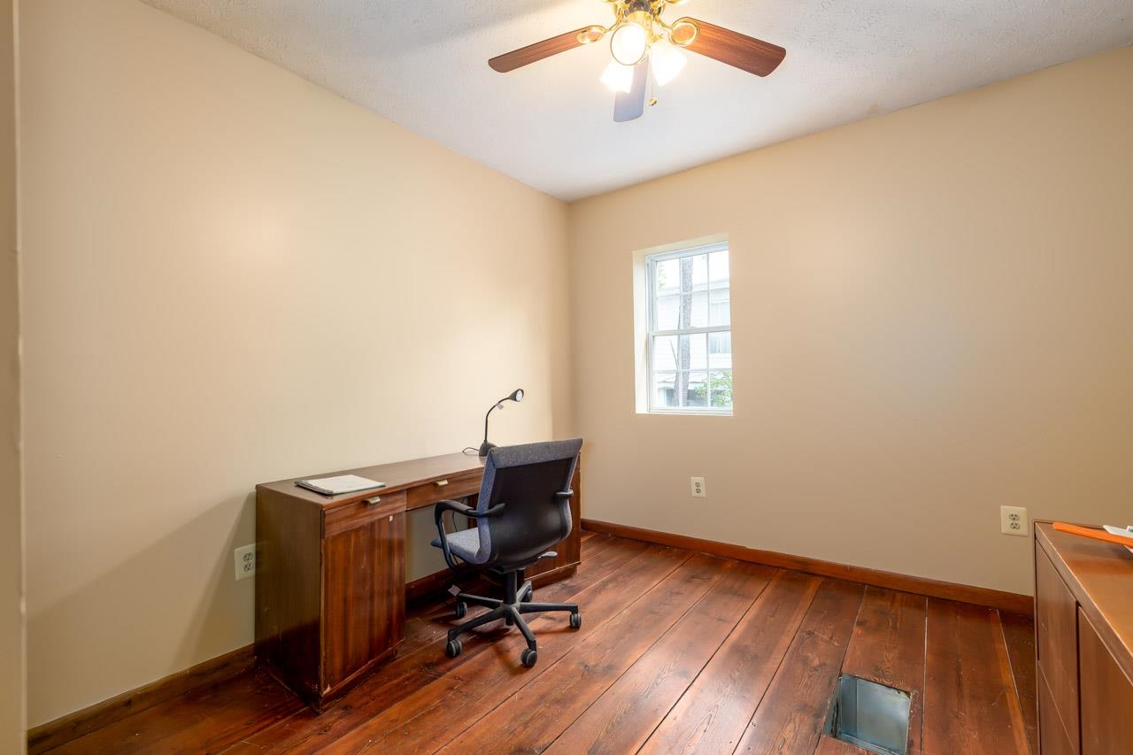 4147 South Middle Road Quicksburg, VA 22847 - Photo 16 of 33 a view of workspace with wooden floor and windows