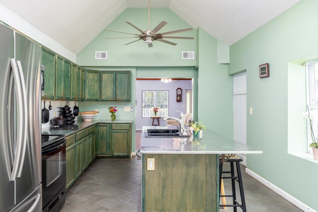 4147 South Middle Road Quicksburg, VA 22847 - Photo 2 of 33 a kitchen with a table and chairs