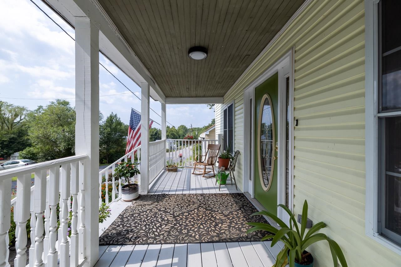 4147 South Middle Road Quicksburg, VA 22847 - Photo 22 of 33 a view of a porch with wooden floor and stairs