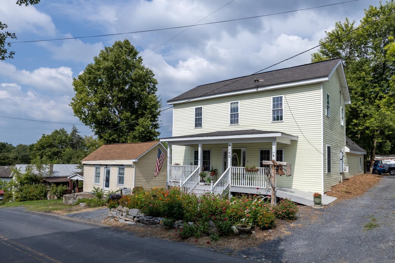 4147 South Middle Road Quicksburg, VA 22847 - Photo 24 of 33 a front view of a house with garden