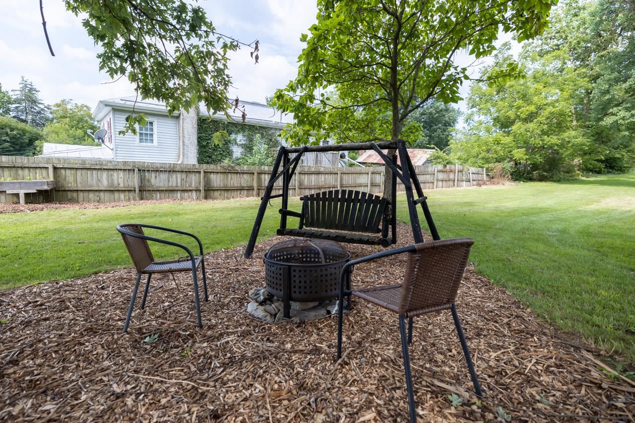 4147 South Middle Road Quicksburg, VA 22847 - Photo 32 of 33 a view of a two chairs in a backyard
