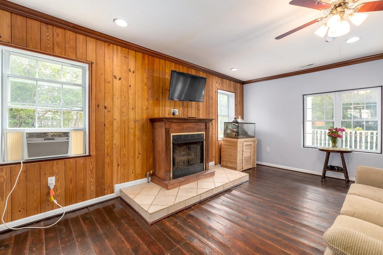 4147 South Middle Road Quicksburg, VA 22847 - Photo 9 of 33 a living room with furniture and a fireplace