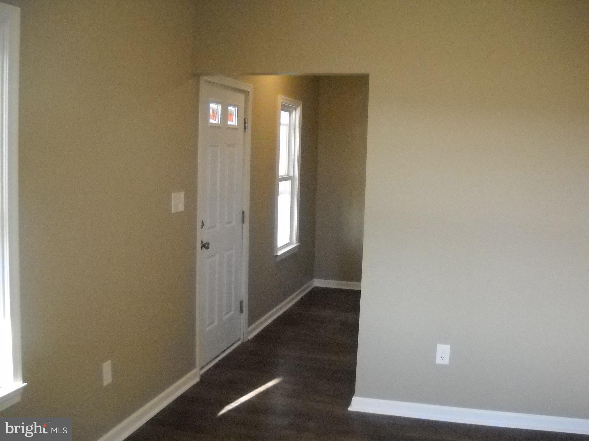 662 Passage Road Winchester, VA 22602 - Photo 13 of 13 a view of a hallway with wooden floor
