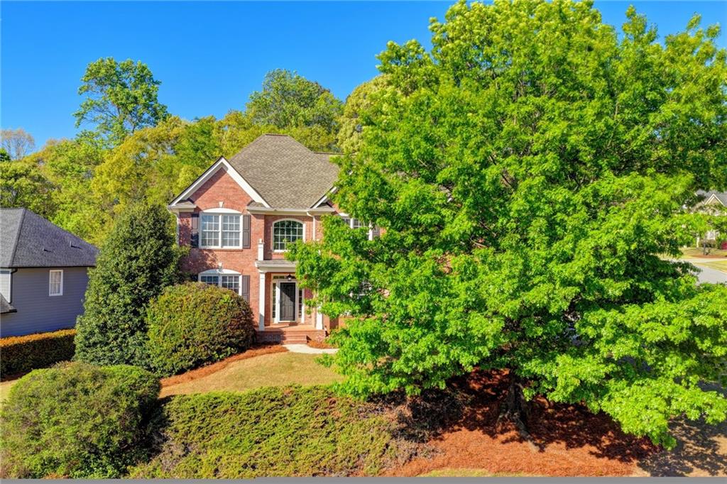 3407 Highland Forge Trail Dacula, GA 30019 - Photo 2 of 71 a view of a house with a backyard