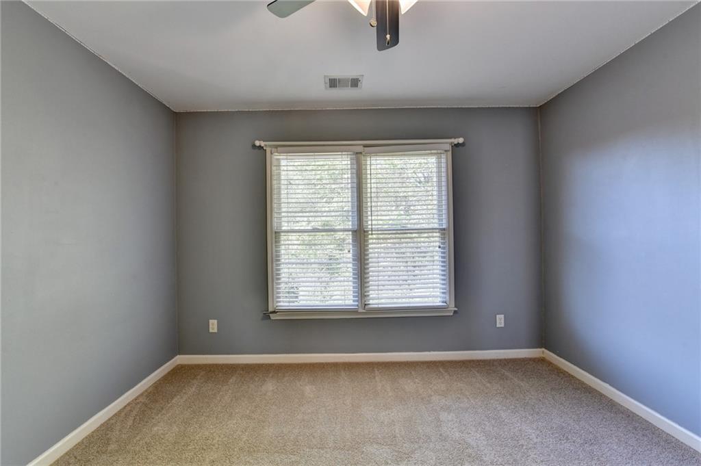 3407 Highland Forge Trail Dacula, GA 30019 - Photo 28 of 71 an empty room with a window