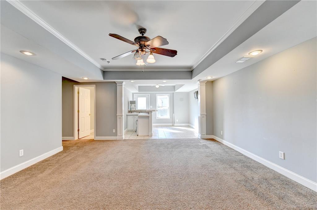 3407 Highland Forge Trail Dacula, GA 30019 - Photo 33 of 71 a view of a livingroom with a ceiling fan and window