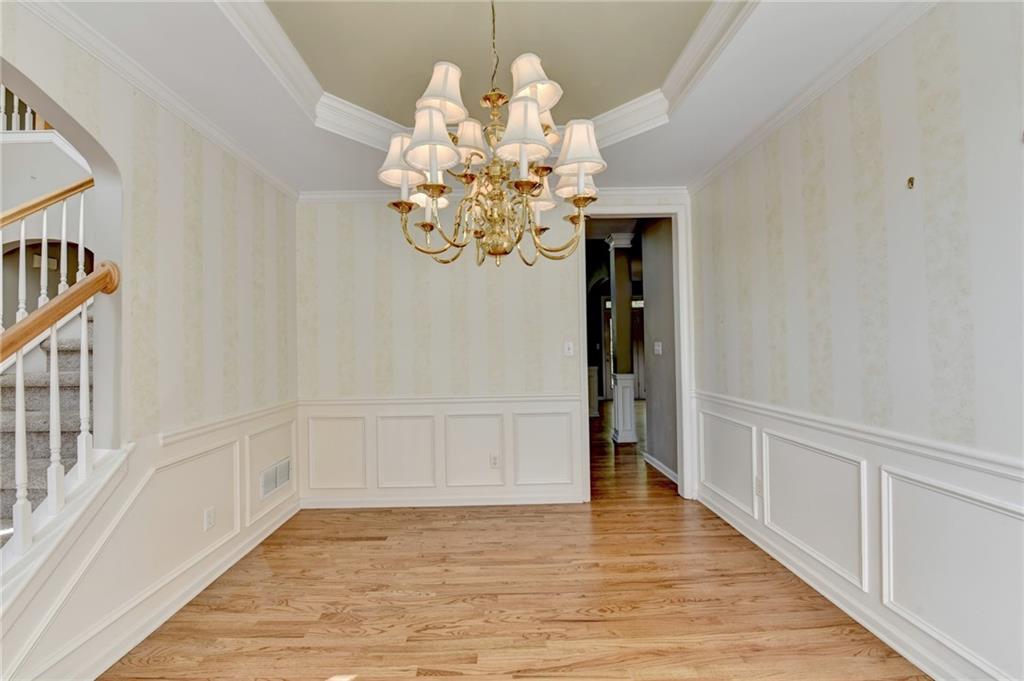 3407 Highland Forge Trail Dacula, GA 30019 - Photo 35 of 71 a view of an entryway with wooden floor