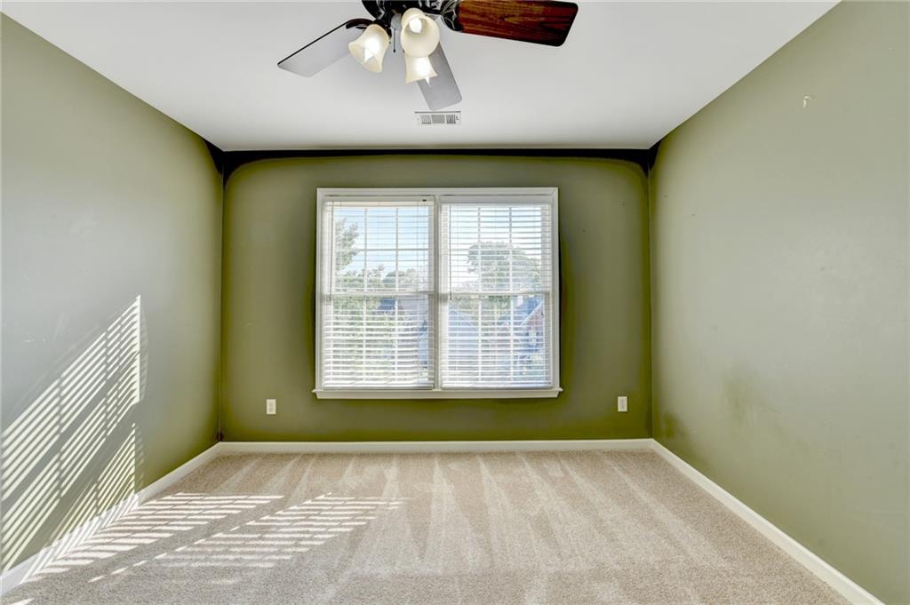 3407 Highland Forge Trail Dacula, GA 30019 - Photo 49 of 71 a view of an empty room with a window