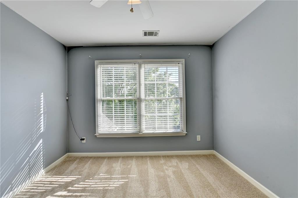 3407 Highland Forge Trail Dacula, GA 30019 - Photo 52 of 71 a view of an empty room with a window