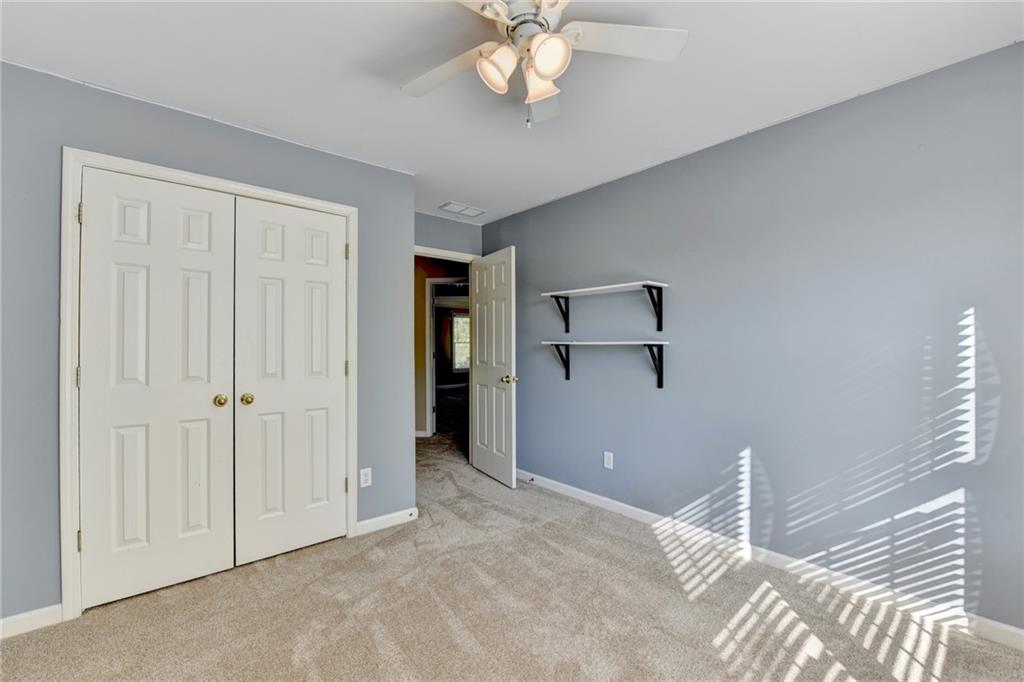 3407 Highland Forge Trail Dacula, GA 30019 - Photo 53 of 71 a view of a chandelier fan and entryway