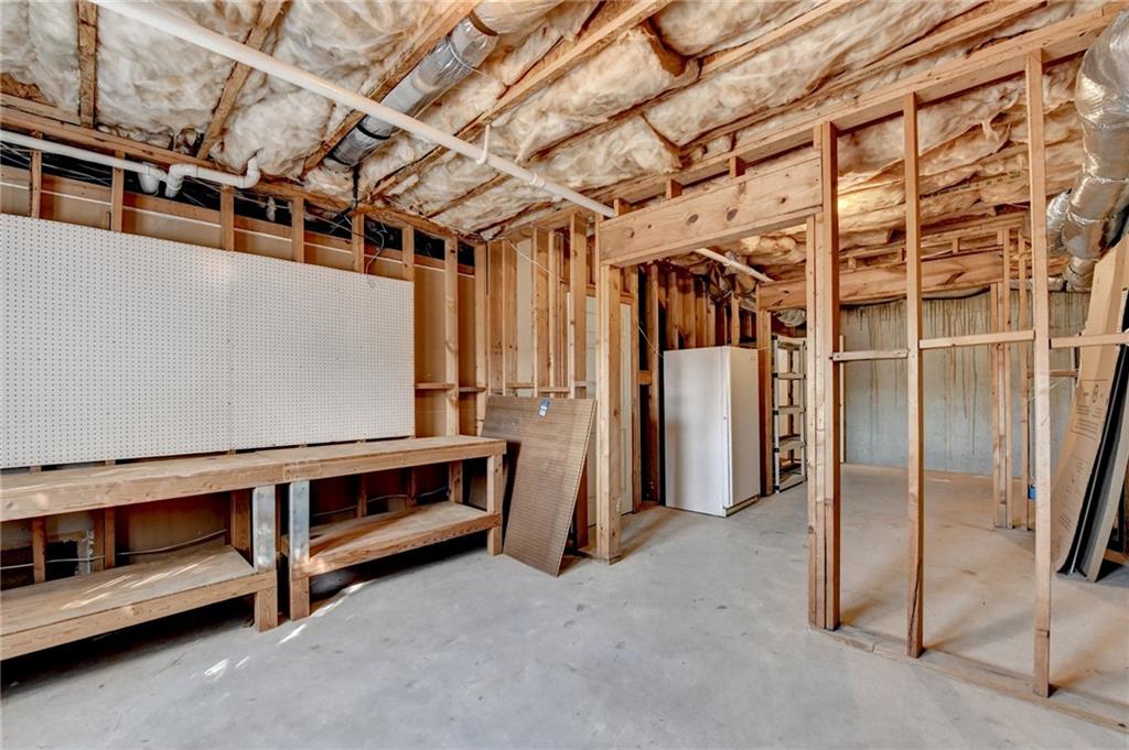 3407 Highland Forge Trail Dacula, GA 30019 - Photo 66 of 71 a view of an empty room with a washing machine