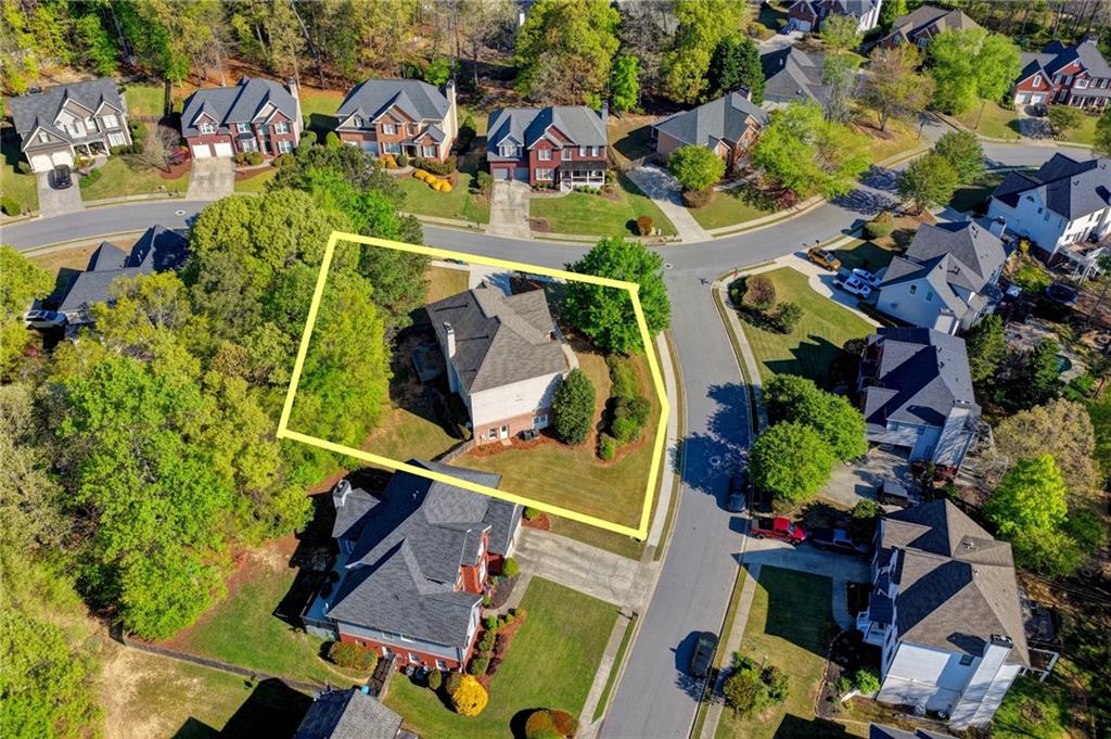 3407 Highland Forge Trail Dacula, GA 30019 - Photo 70 of 71 an aerial view of residential house with outdoor space and swimming pool
