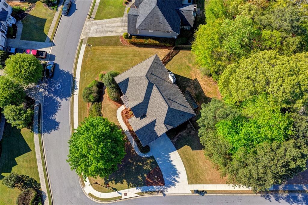 3407 Highland Forge Trail Dacula, GA 30019 - Photo 71 of 71 an aerial view of a house with a yard and large trees