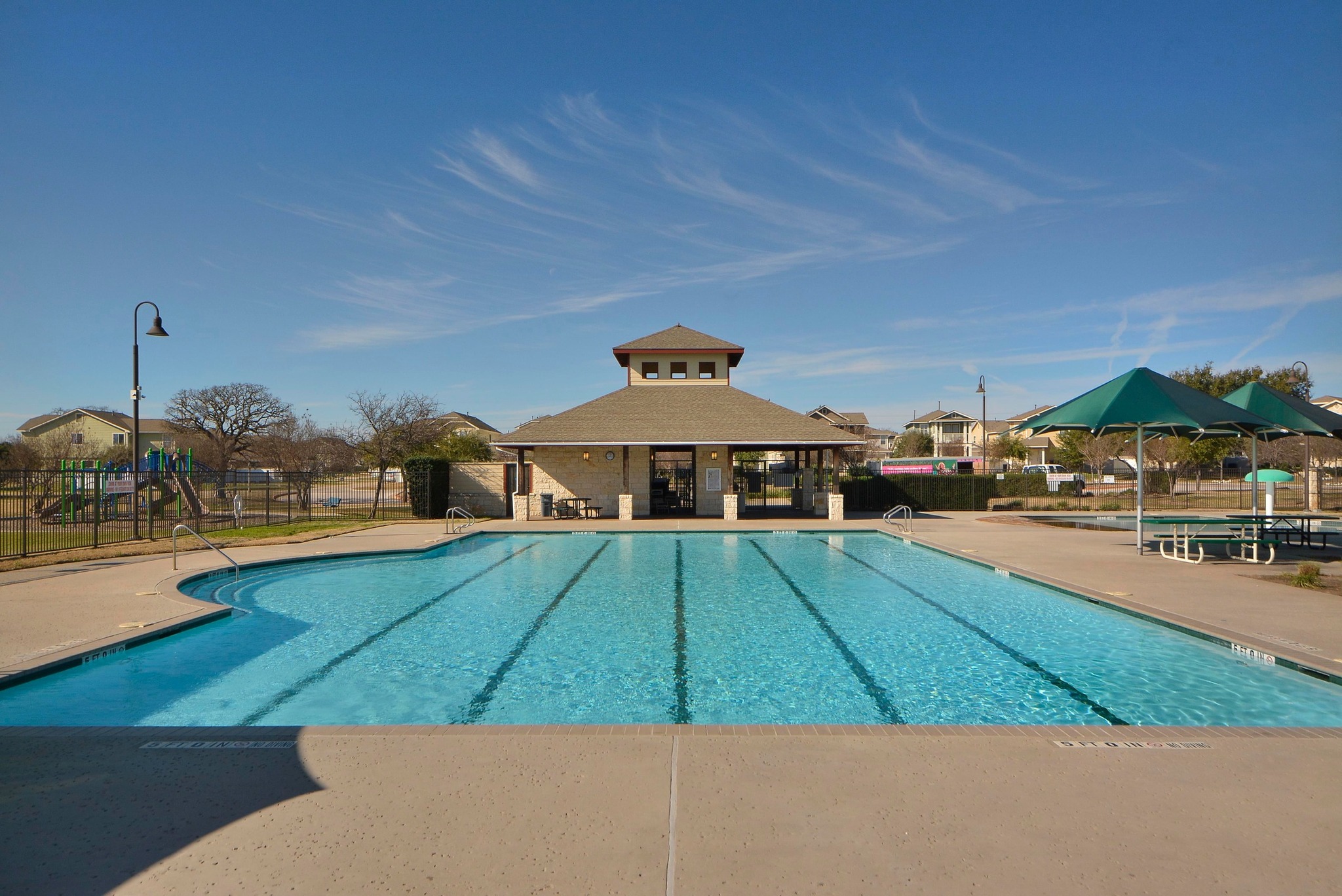 1818 Lost Maples Loop Cedar Park, TX 78613 - Photo 34 of 38 A sparkling community pool with dedicated swim lanes awaits, perfect for recreation and fitness.