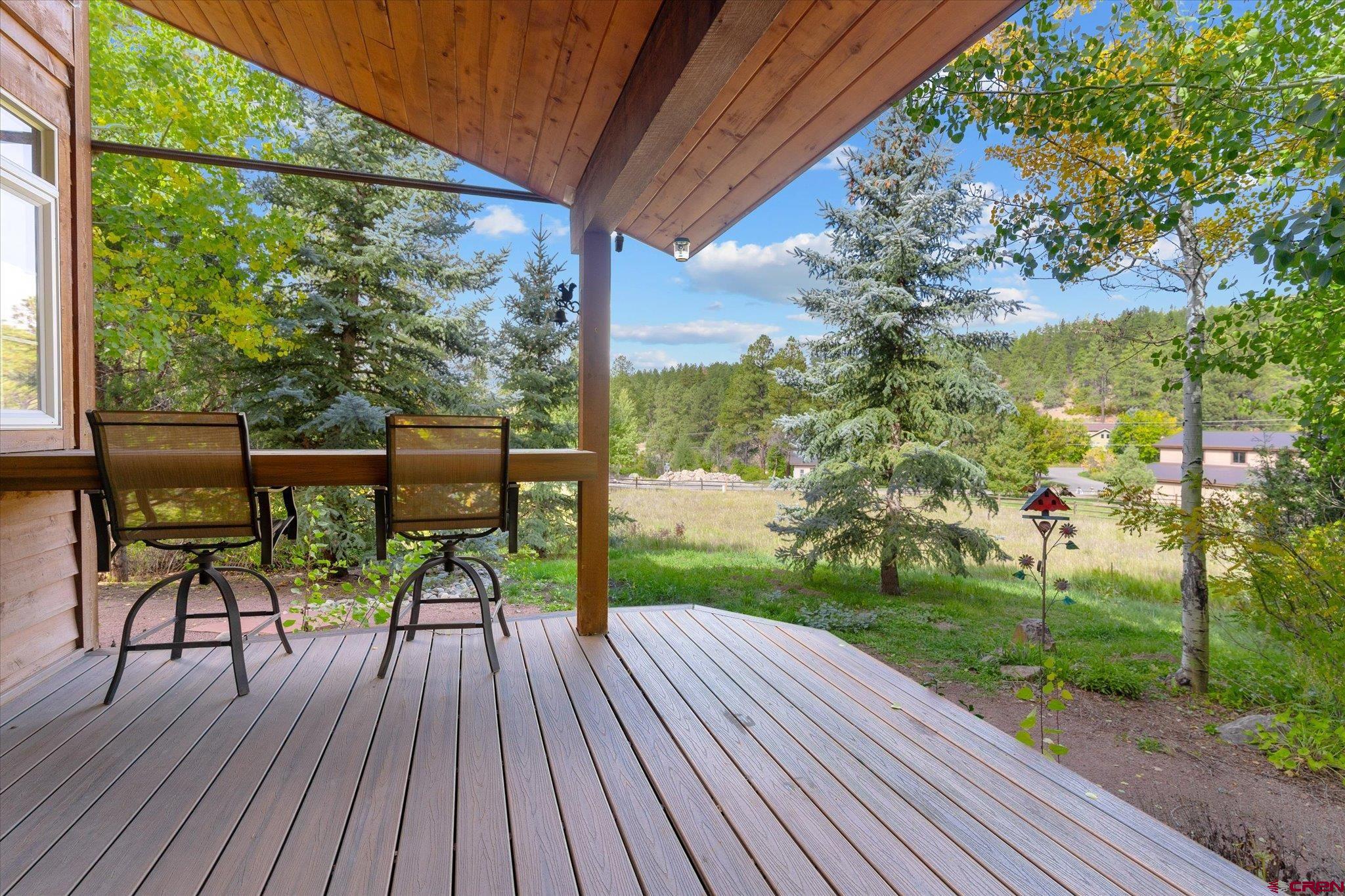 73 Ute Pass Road Durango, CO 81301 - Photo 31 of 44 a view of a two chairs with table in the patio